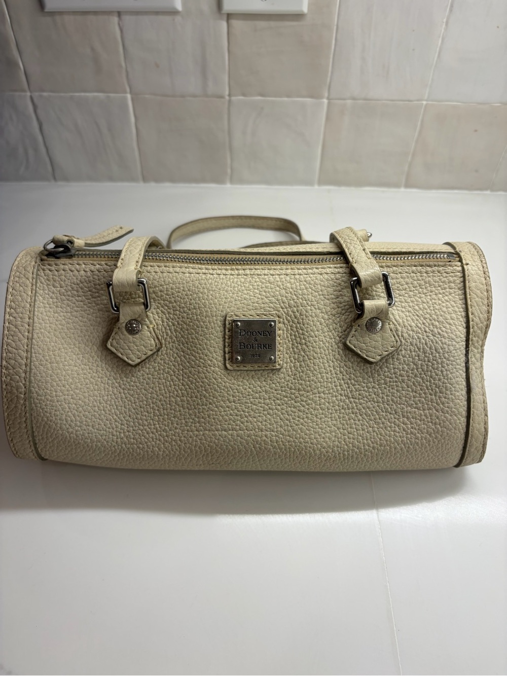 Dooney & Bourke Cream Pebbled Leather Barrel Satchel